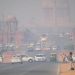 Delhi, India - November 21, 2017: Heavy traffic on the streets of New Delhi  in New Delhi covered in heavy smog.